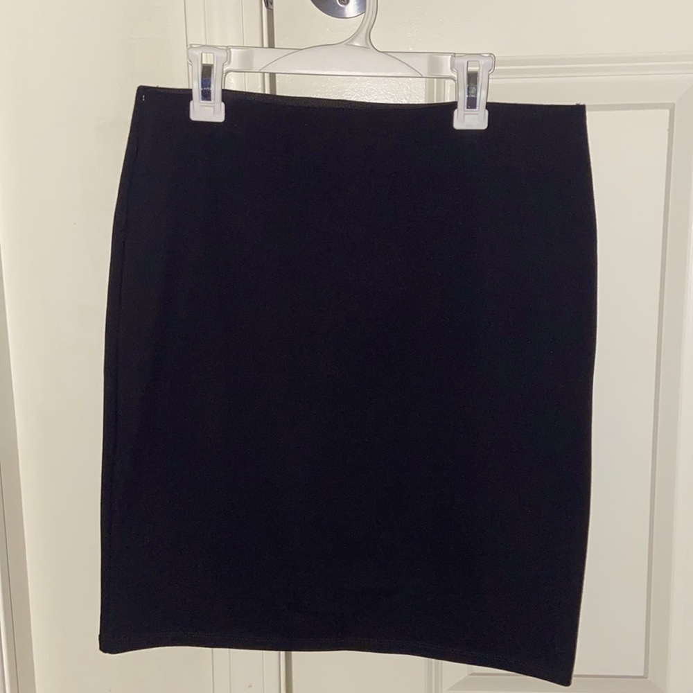 Size medium petite pull on black pencil skirt from The LOFT